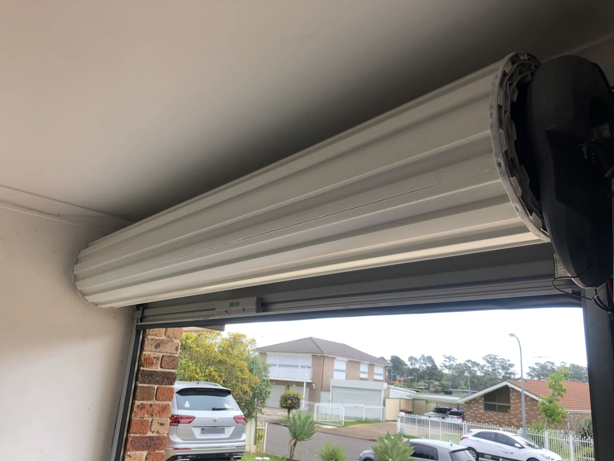 Why Regular Garage Door Servicing Saves You Money